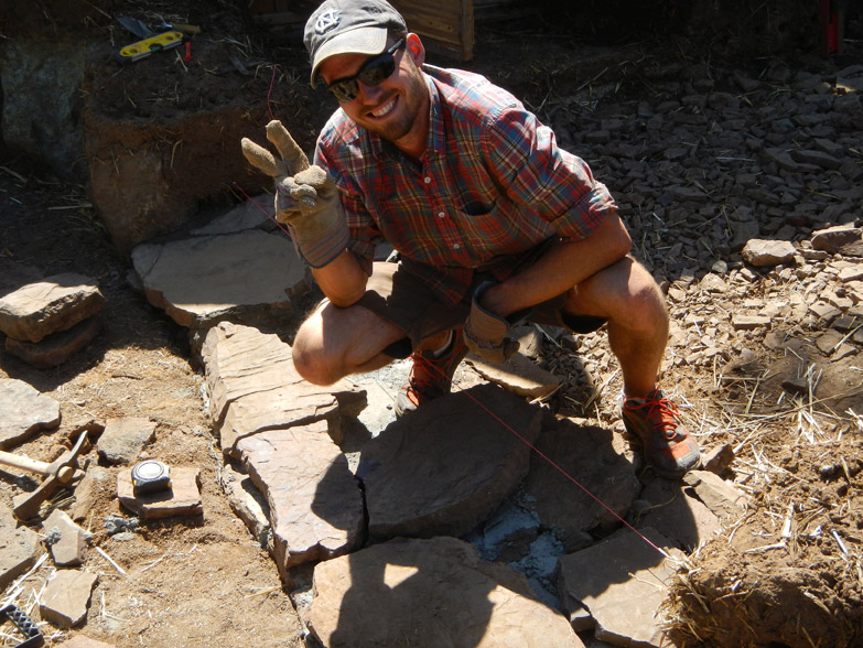 The doorstep is made of local flagstones held in place with cement mortar. Galen took this on as a personal project. 