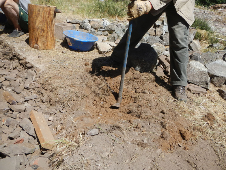 Step 1 - digging the trench; not an easy task in this super-rocky soil! 