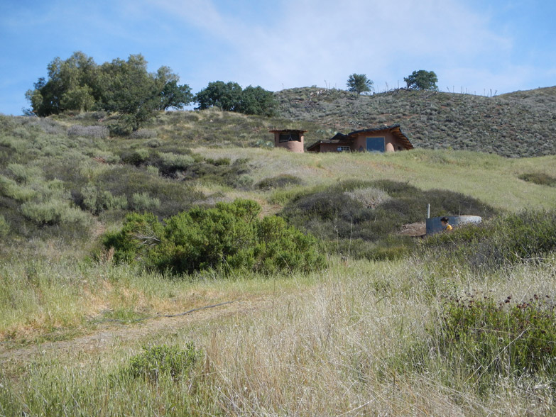 "Playhouse" cob home tucked away in the hills