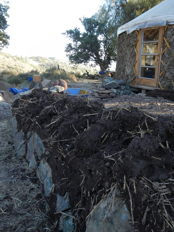 To help the wall dry on the inside and to integrate the layers of cob better, we create these spines and ribs prior to leaving the site for the day.