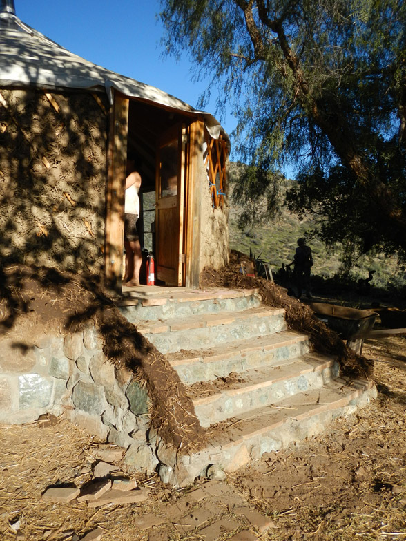 Finished stairs with cob wall base (the plan is to build the walls up to create a protected porch-like space)